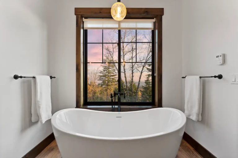 Soak in the deep tub while enjoying the lake, river and mountain views.