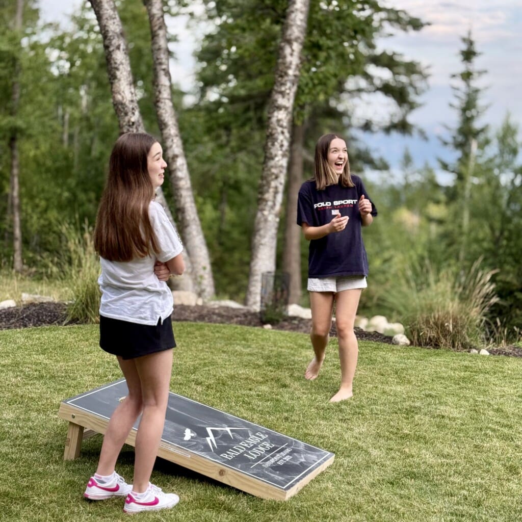 Afternoon Cornhole on grass